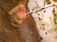 Shit covered gay man jerking his fat cock